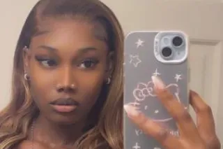 Your favorite Jamaican playmat... - Image 1